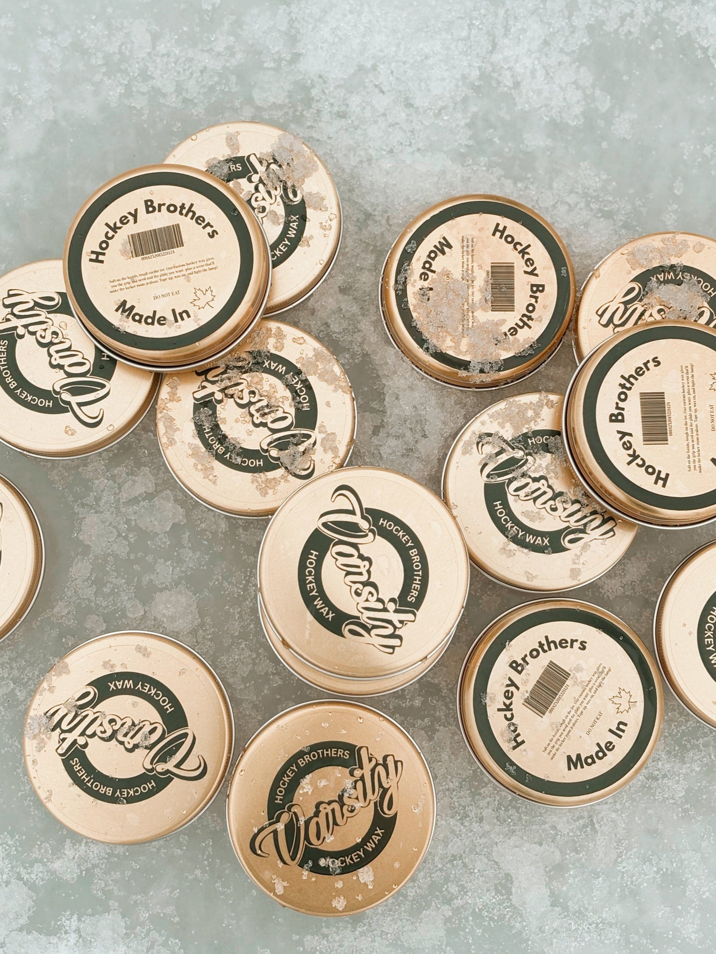 Our Varsity hockey wax spread all over the ice in their containers.