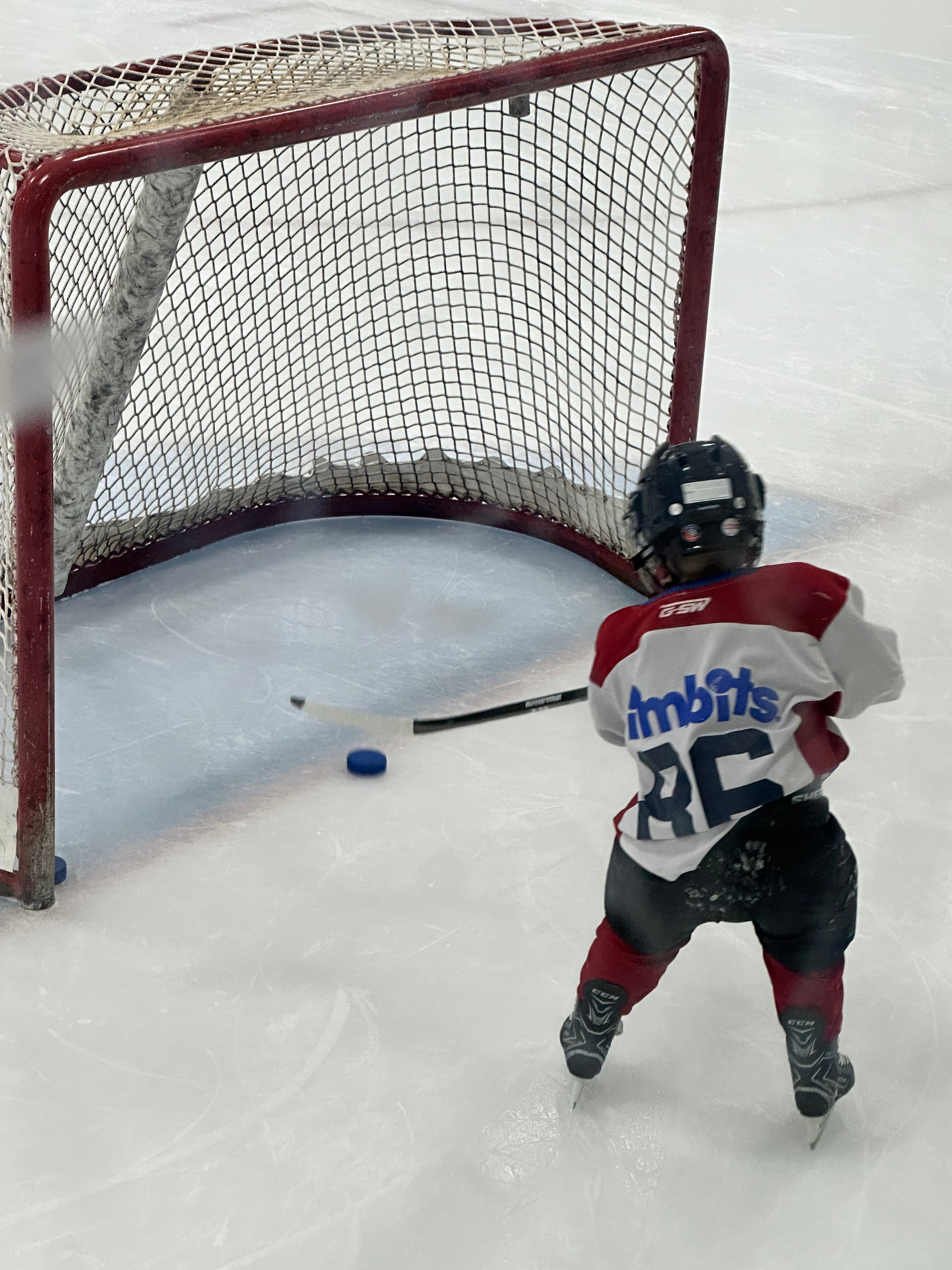 Carter scoring a goal playing for Timbits Hockey. He is using the varsity hockey wax as well as he gave it to his team-mates to use as well.