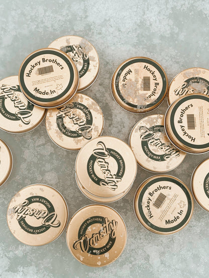 Our Varsity hockey wax spread all over the ice in their containers. 